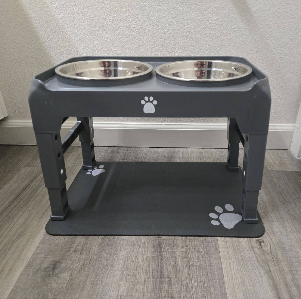 Adjustable dog bowl stand.